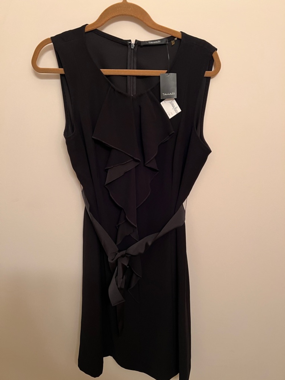 Tahari Black Sleeveless Ruffle-Front cocktail dress.